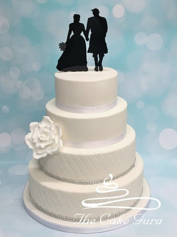 Scottish Groom in Kilt and Bride Wedding Cake