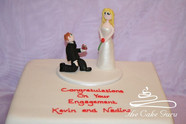 Proposing Figure Engagement Cake