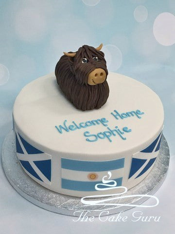 Highland Cow Welcome Home cake
