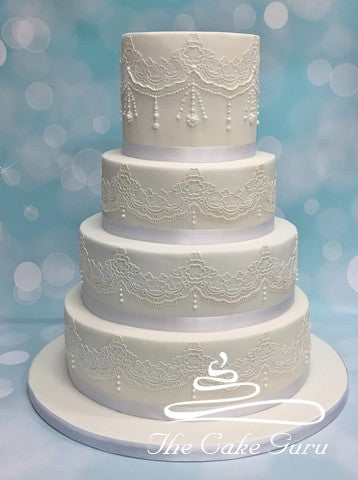 Lace With Added Piped Detailing Wedding Cake